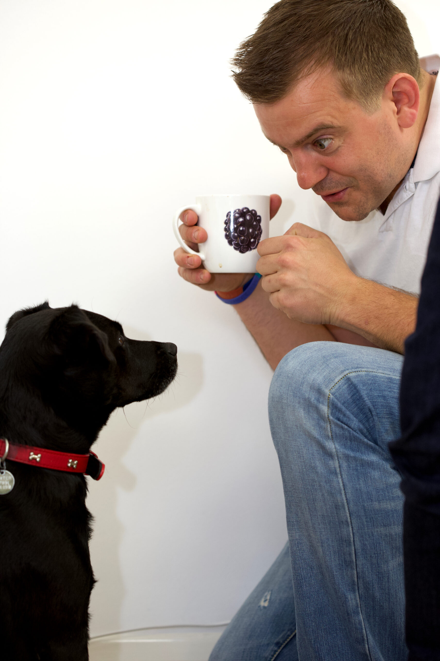 Phil on a photoshoot with one of my mugs and our dog Dexter Phil on a photoshoot with one of my mugs and our dog Dexter